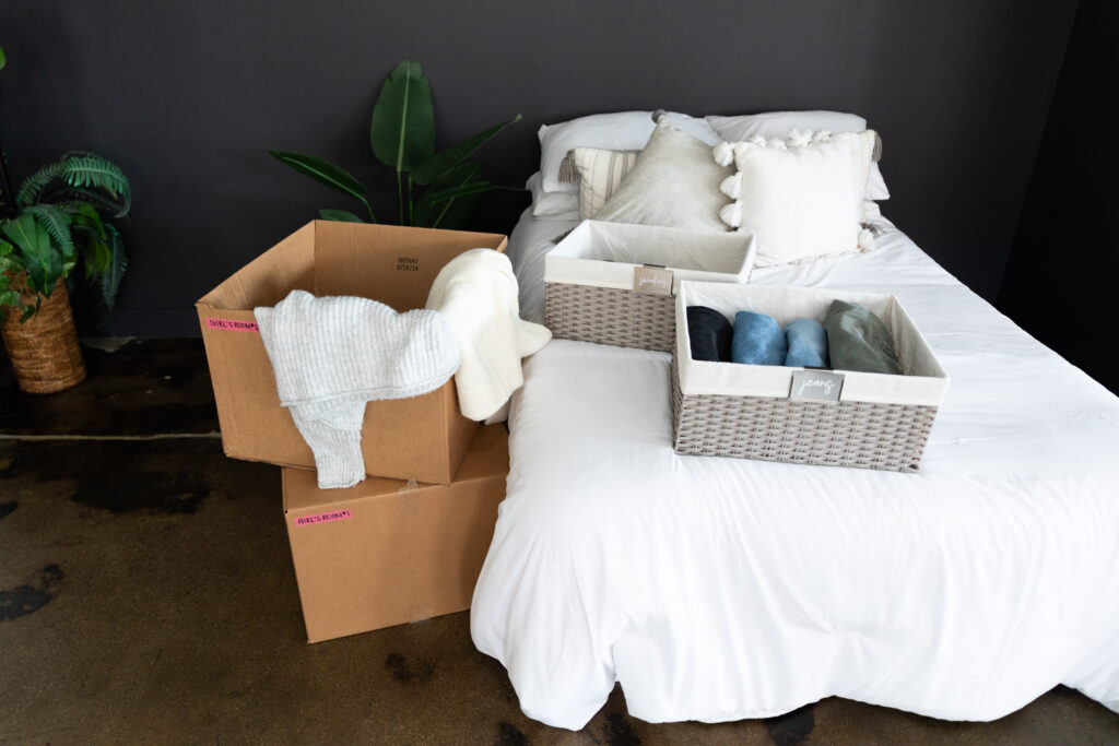 Professional home organizers in Salt Lake City helping our clients declutter before a big move with personalized, stress-free systems.